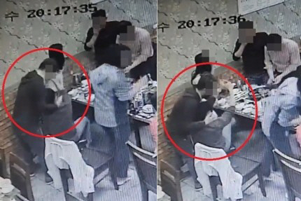 국민의힘 소속 동료 여성 부천시의원 B씨의 목을 끌어안는 더불어민주당 소속 시의원 B씨의 CCTV 모습. <연합뉴스>